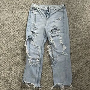 light wash , high waisted, comfort stretch waistband, mom jeans .